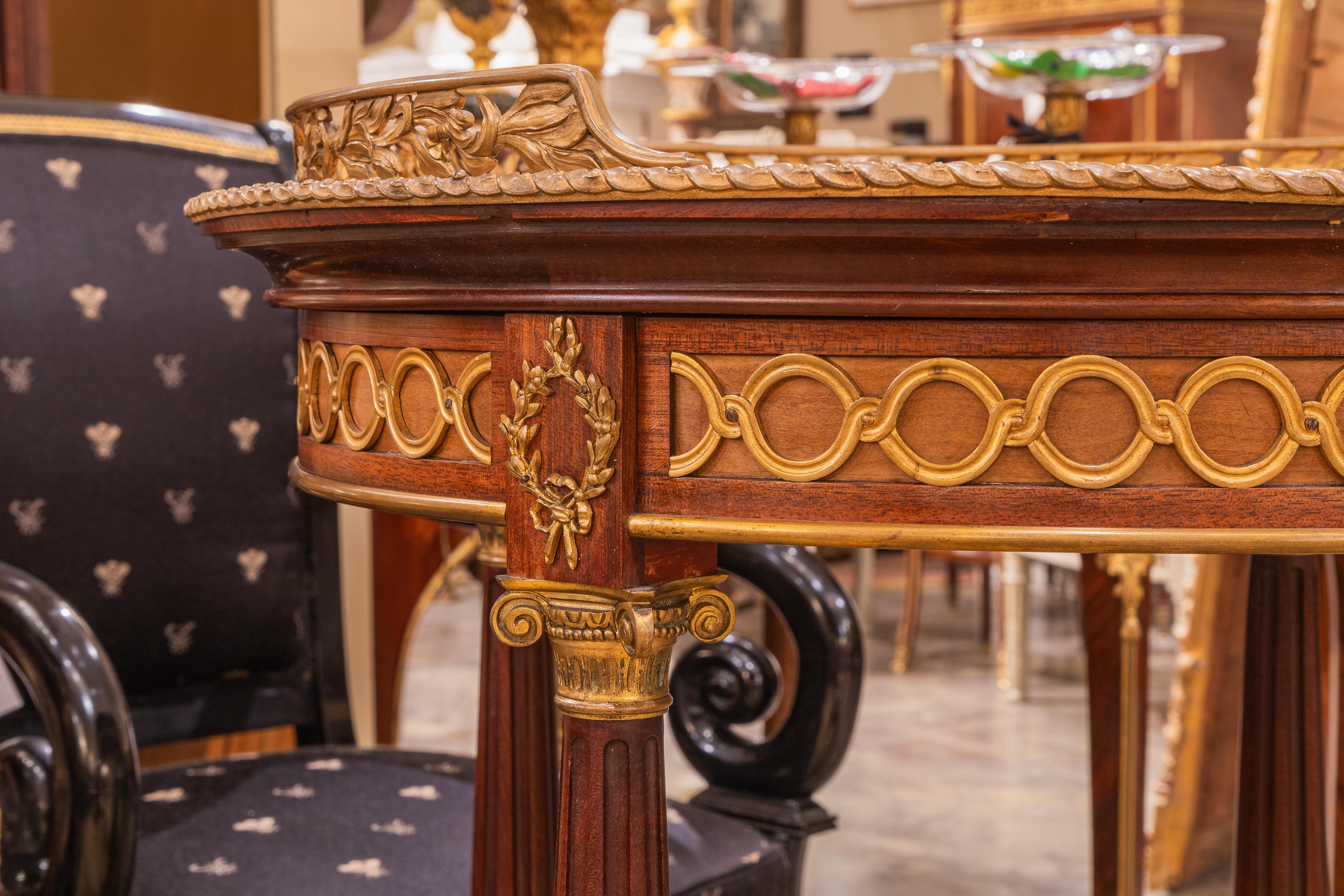 A fine 19th century French Louis XVI mahogany and gilt bronze mounted gueridon In Good Condition For Sale In Dallas, TX