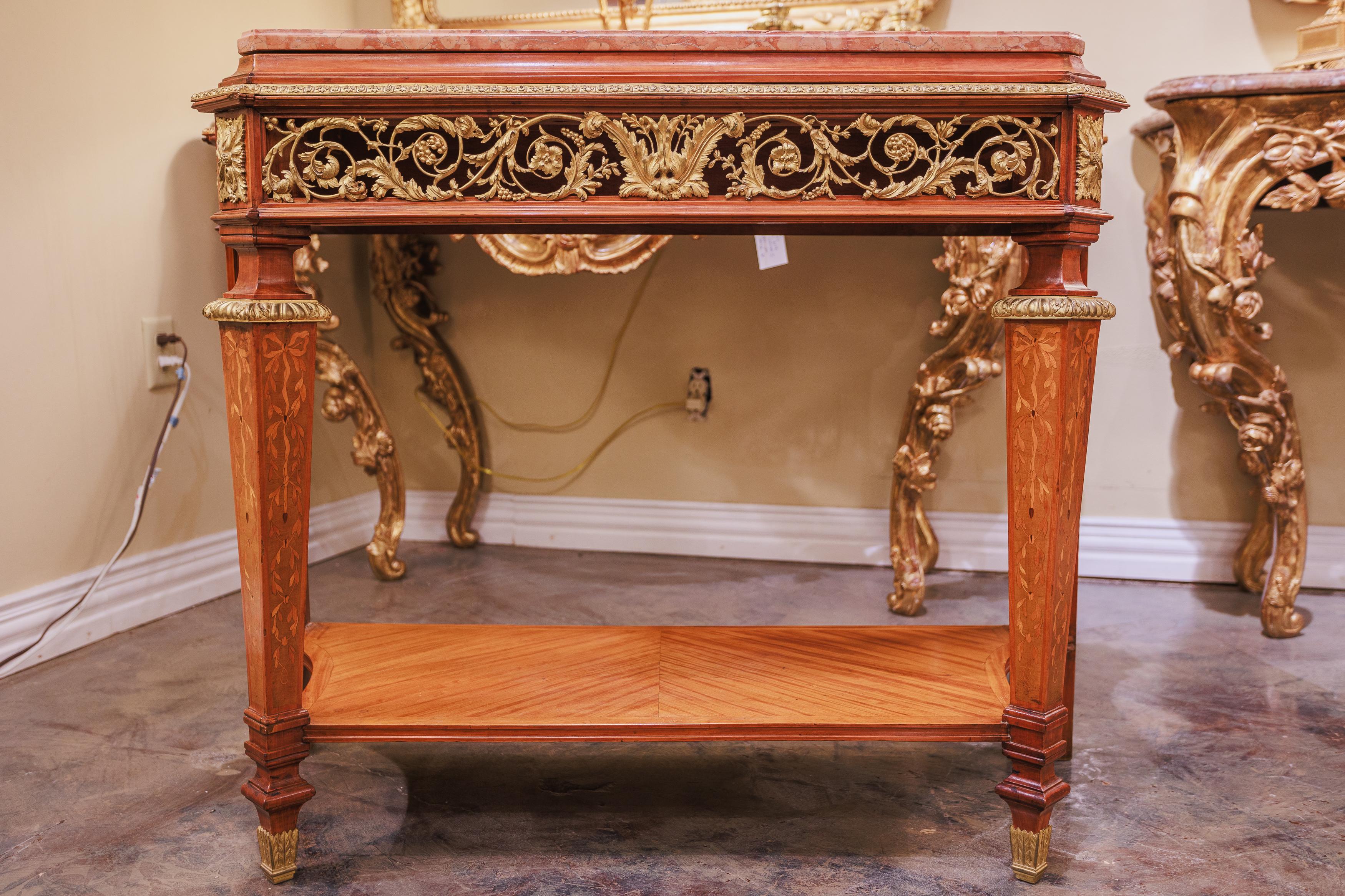 A fine 19th century French Louis XVI mahogany and marble topped console. Signed by French cabinetmaker Maison Forest. Fine gilt bronze details in the frieze. Original marble top