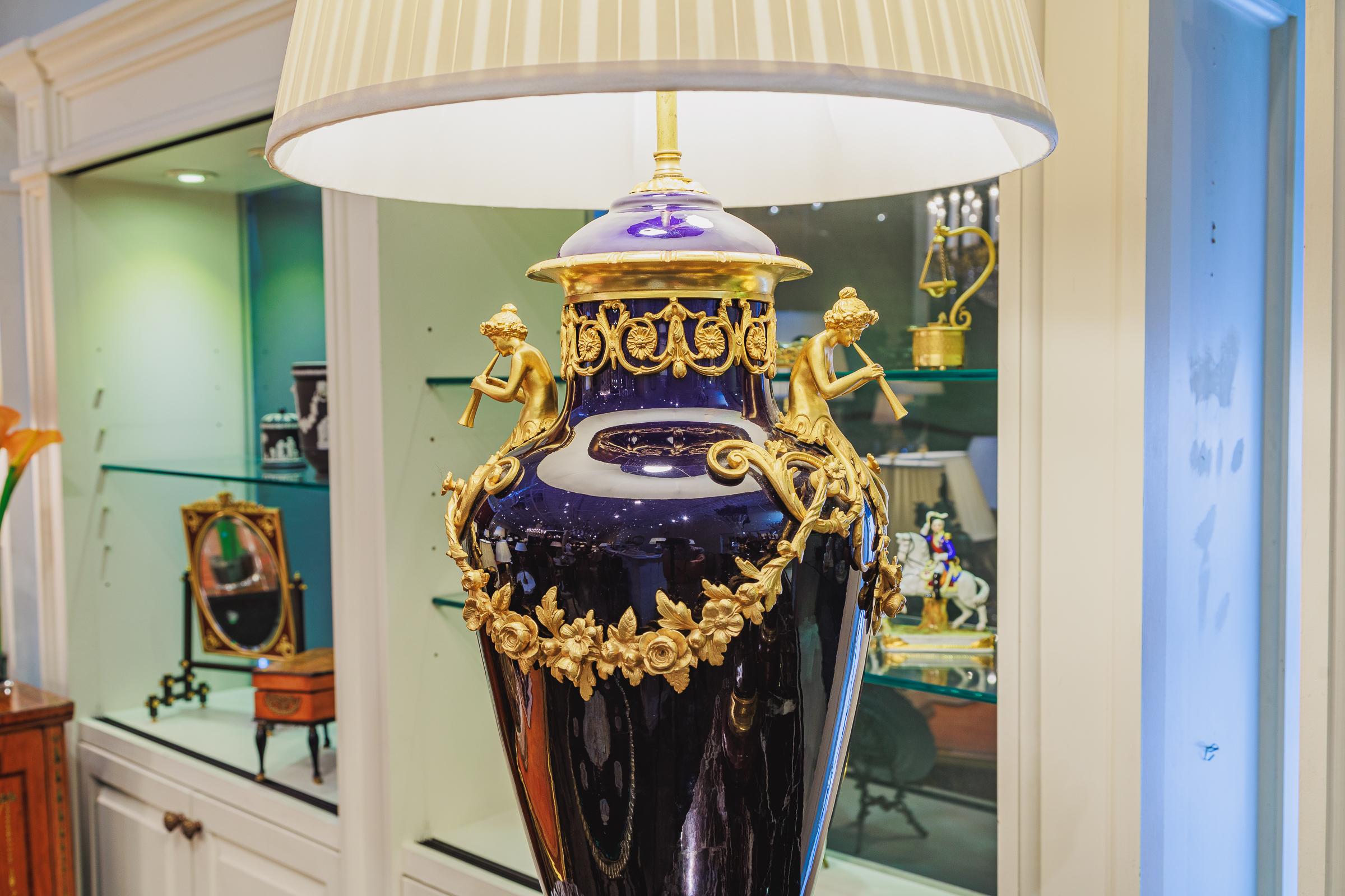A fine and large 19th century French Sevre's porcelain and gilt bronze mounted lamp.