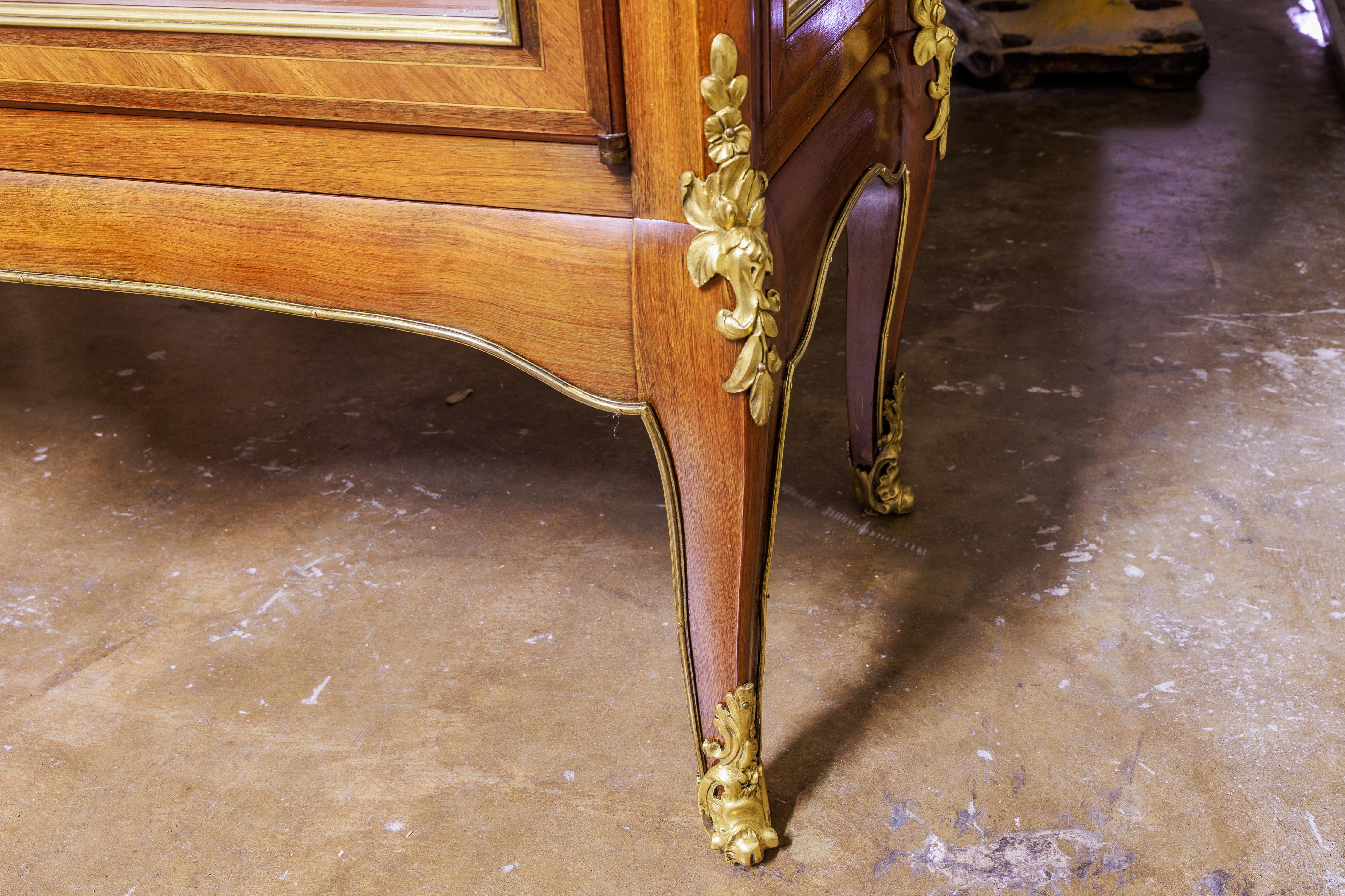 A fine 19th century French  viewing cabinet by G. Durand . Very fine mahogany vitrine with fine fire gilt bronze dore mounts . Three glass shelves. Stamped G. Durand  several times on the back. 