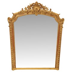 A  Fine 19th Century Giltwood  Overmantel Mirror with Central Shell Cartouche