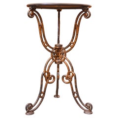 A fine 19th century Italian rod iron side table with a pietra dura marble top.