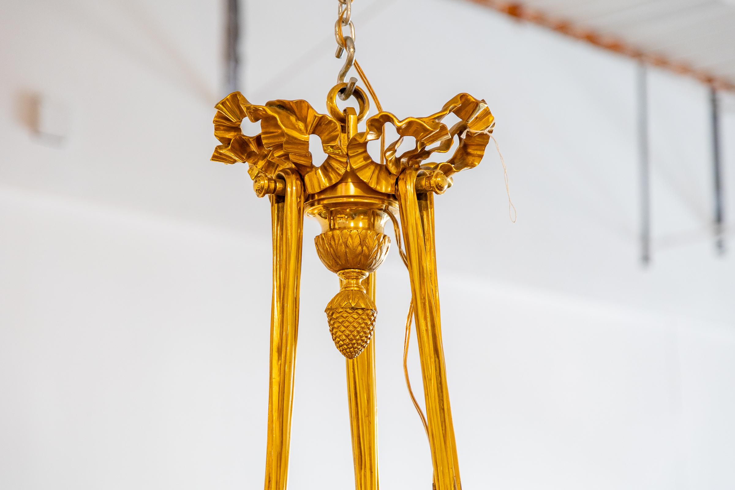 A fine 19th century French Louis XVI gilt bronze 12 light Louis XVI chandelier.