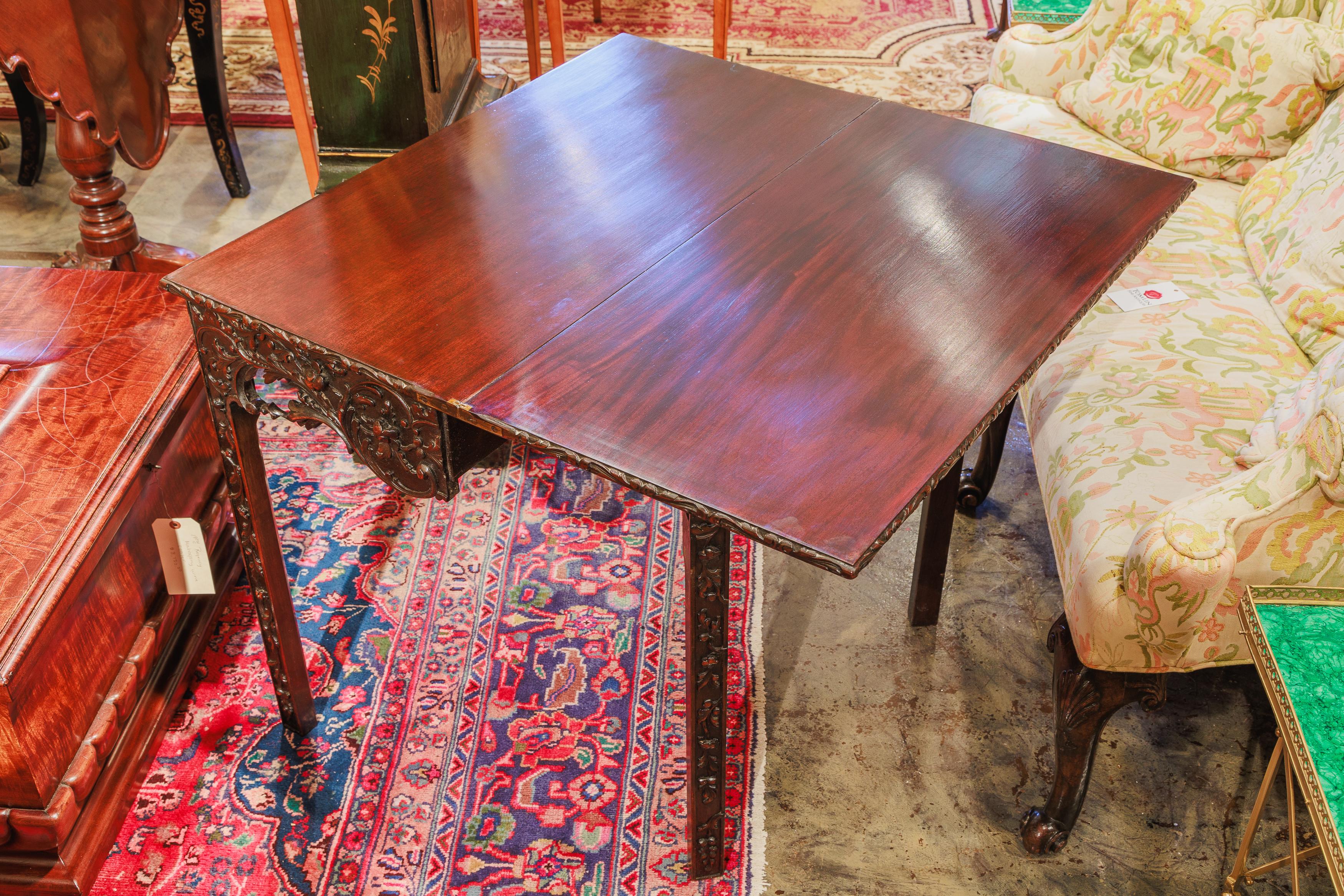 A fine 19th century mahogany Chinese Chippendale games table .  2