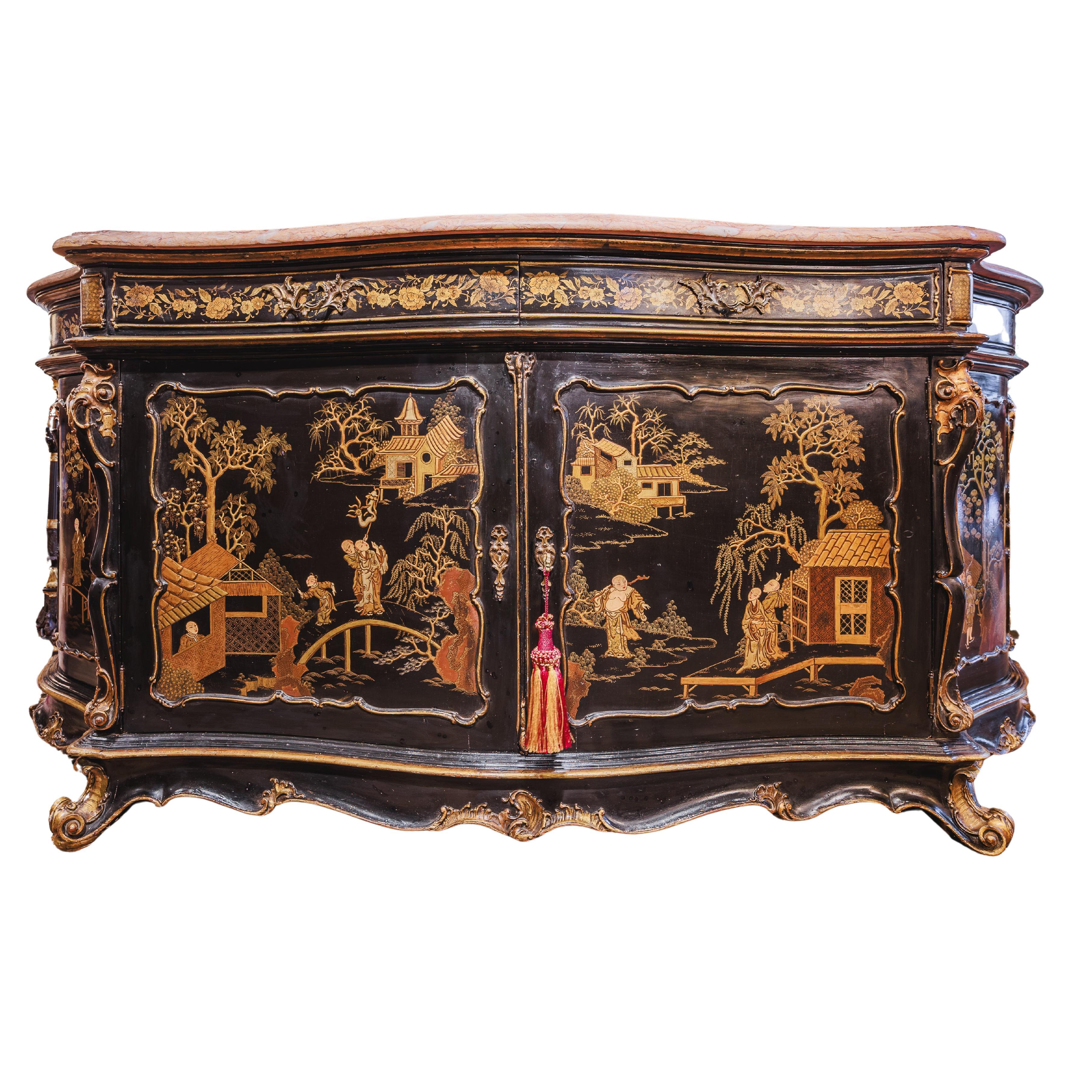 A fine 19th century marble top Chinoiserie decorated credenza. Bronze handles