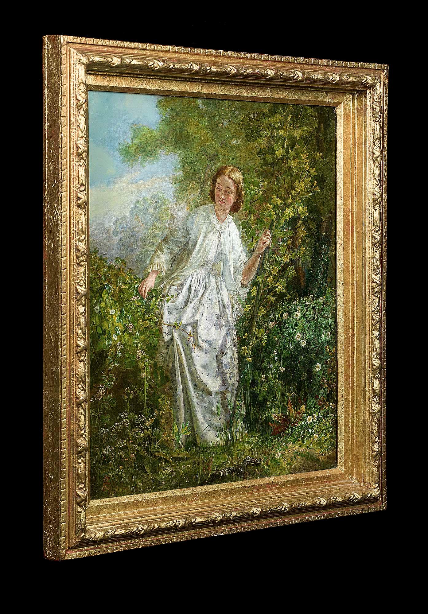 An enchanting, romantic 'Tangled by Roses', oil on board Victorian painting of a maiden wandering in a wild garden or in a lightly wooded setting in the manner of John Everett Millais. It bears the monogram J.E.M. and the date 1869 to the bottom