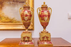 A fine 19th century pair of Royal Viennese lidded urns signed Kaufman