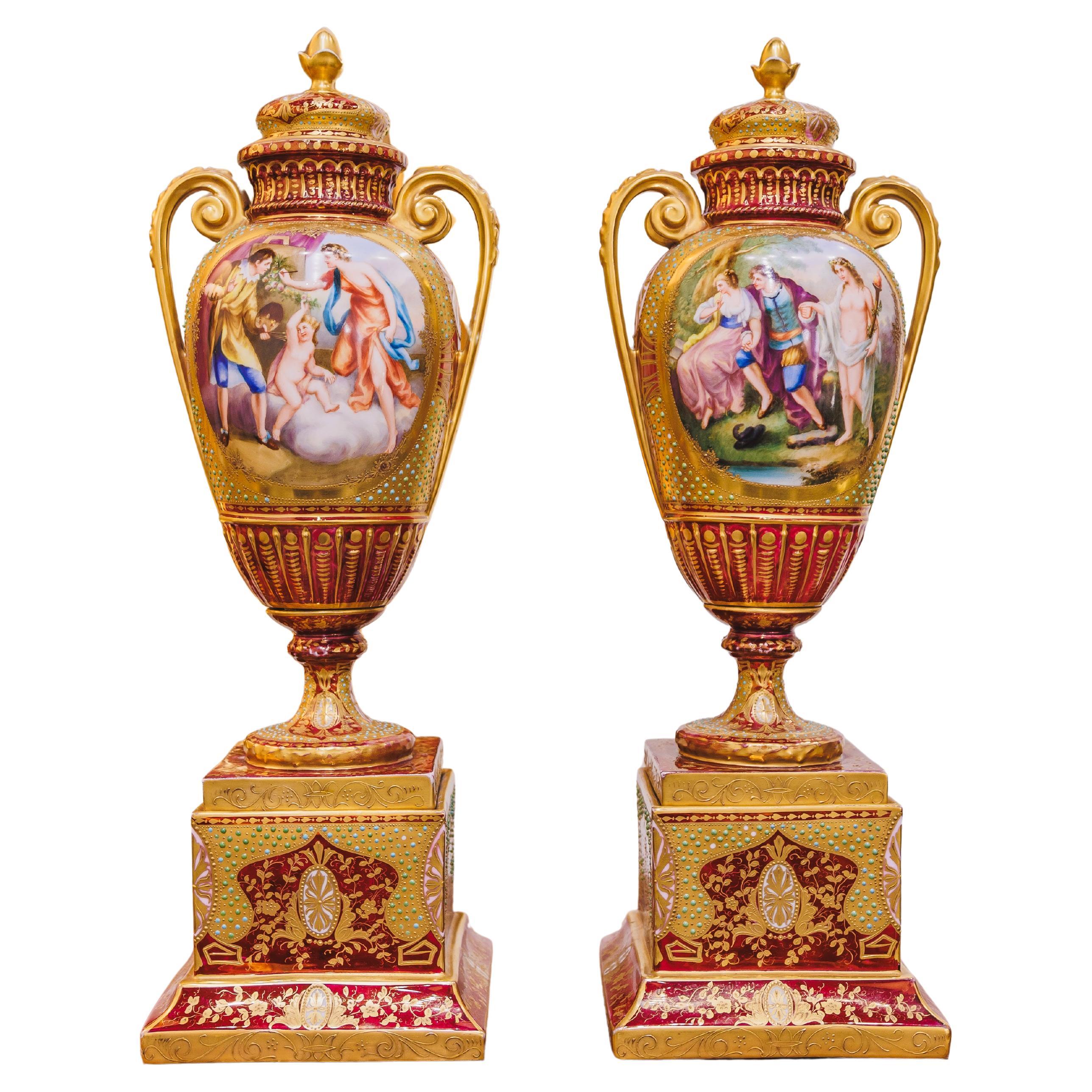A fine 19th century pair of Royal Viennese lidded urns signed Kaufman