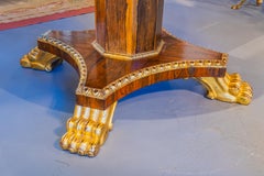 A fine 19th century Rosewood and parcel gilt center table