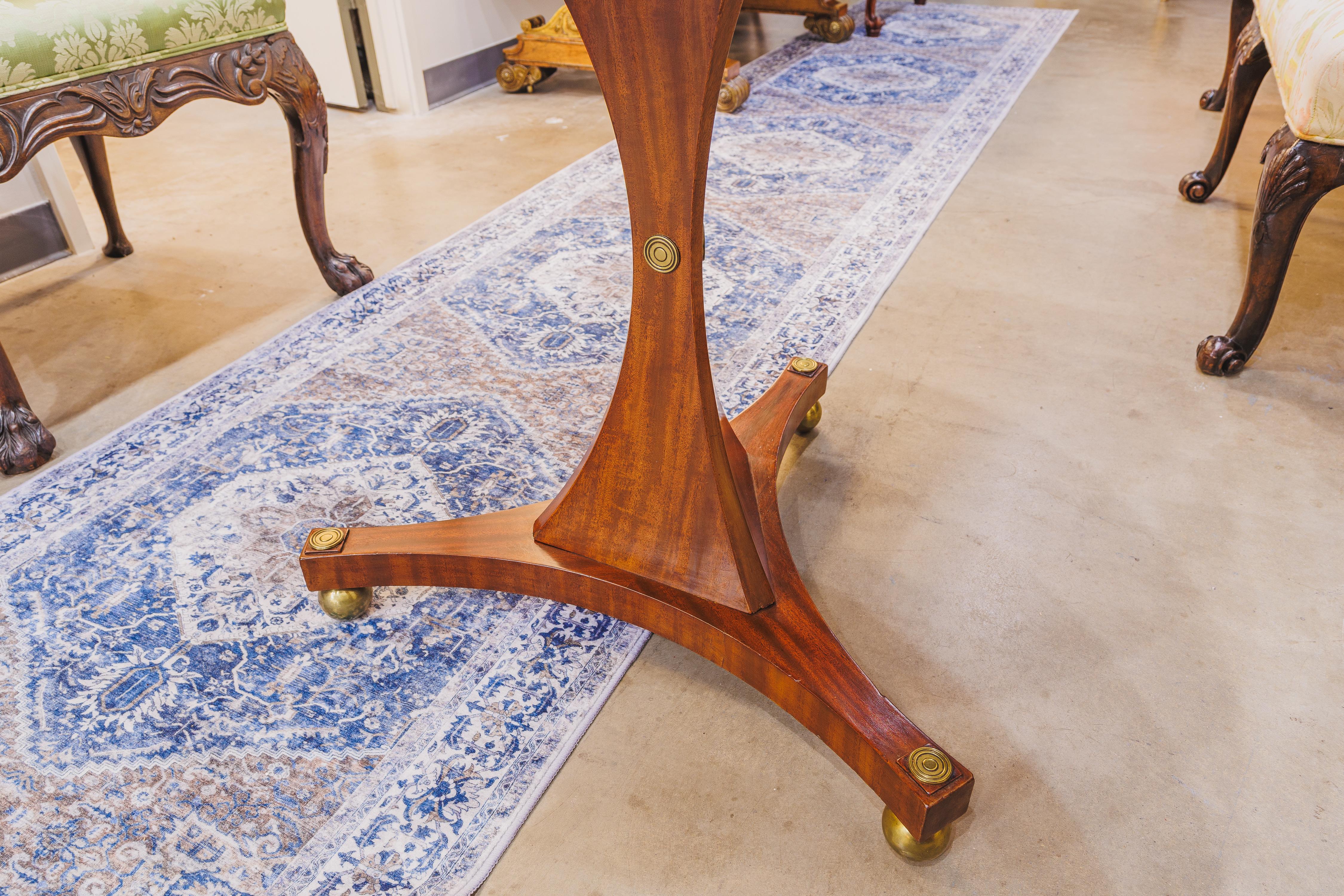Baltic A fine 19th century Russian mahogany and brass mounted small center table For Sale