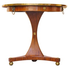 A fine 19th century Russian mahogany and brass mounted small center table