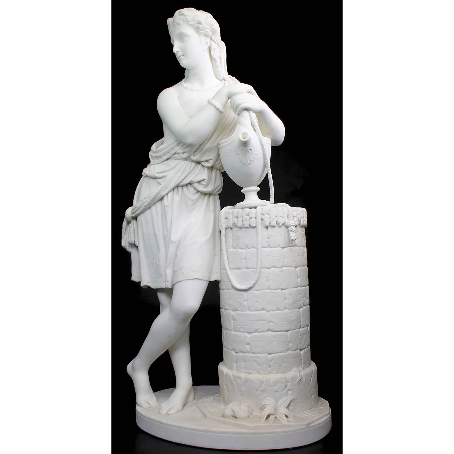 A Fine 19th century white marble sculpture of “Rebecca at The Well” depicting a Classical maiden wearing a robe, with one breast semi-exposed, standing next to a well holding a water urn. Probably Italian Carrara Marble. Artist unknown. Circa: