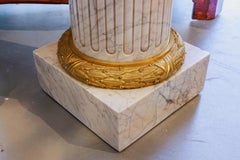 A  fine 19th French Louis XVI Carrera marble and gilt bronze column and vase