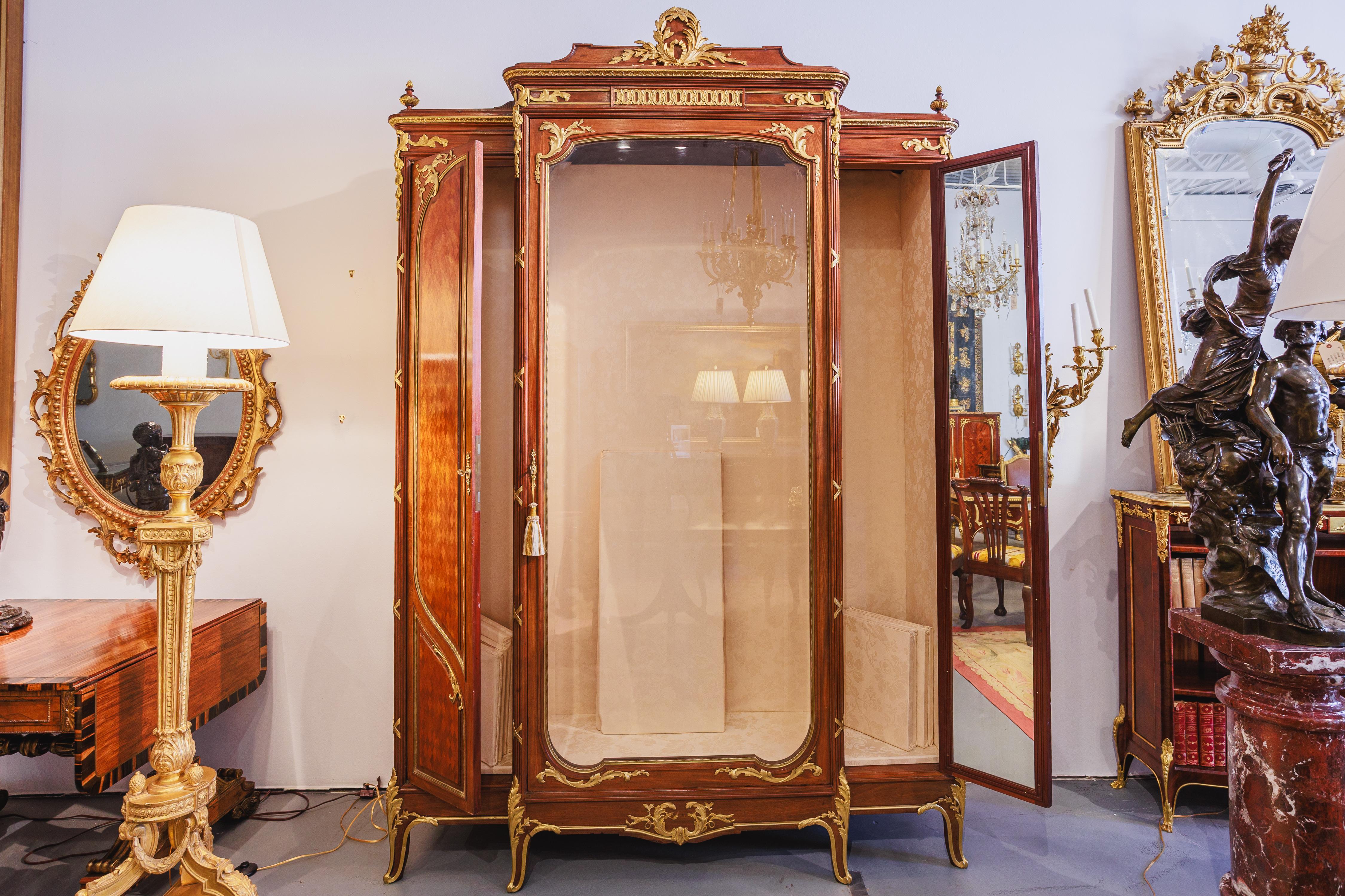 A very fine 19th century French Louis XV kingwood and parquetry designed viewing cabinet. Lined with a gold silk . Fine gilt bronze mounts. Stamped Haentges Freres Paris 