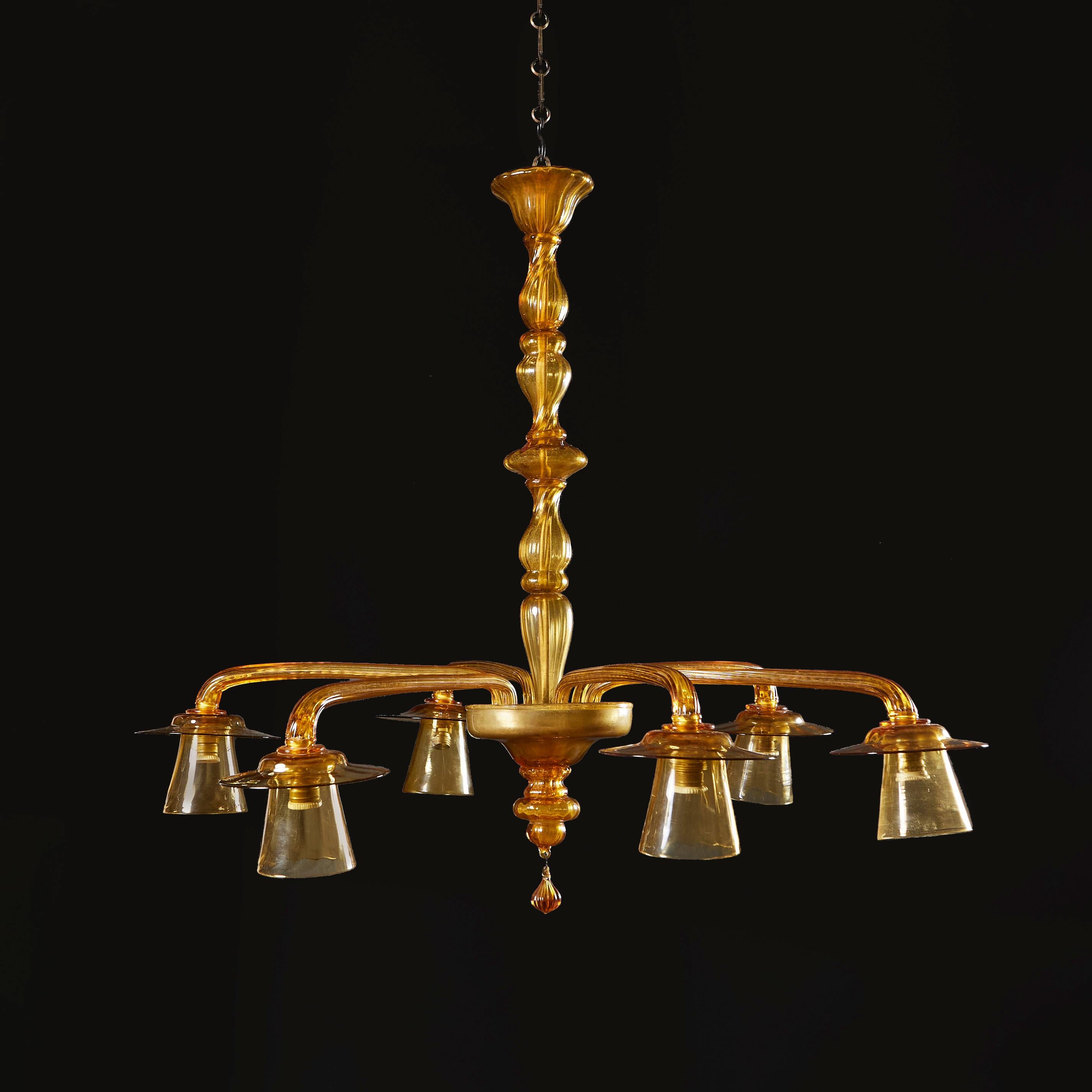 Italy, circa 1930

A fine early twentieth century Murano chandelier after Vittorio Zecchin in amber glass, with six inverted arms with glass shades, the central stem gadrooned and twisting, and all terminating in inverted dome with teardrop finial