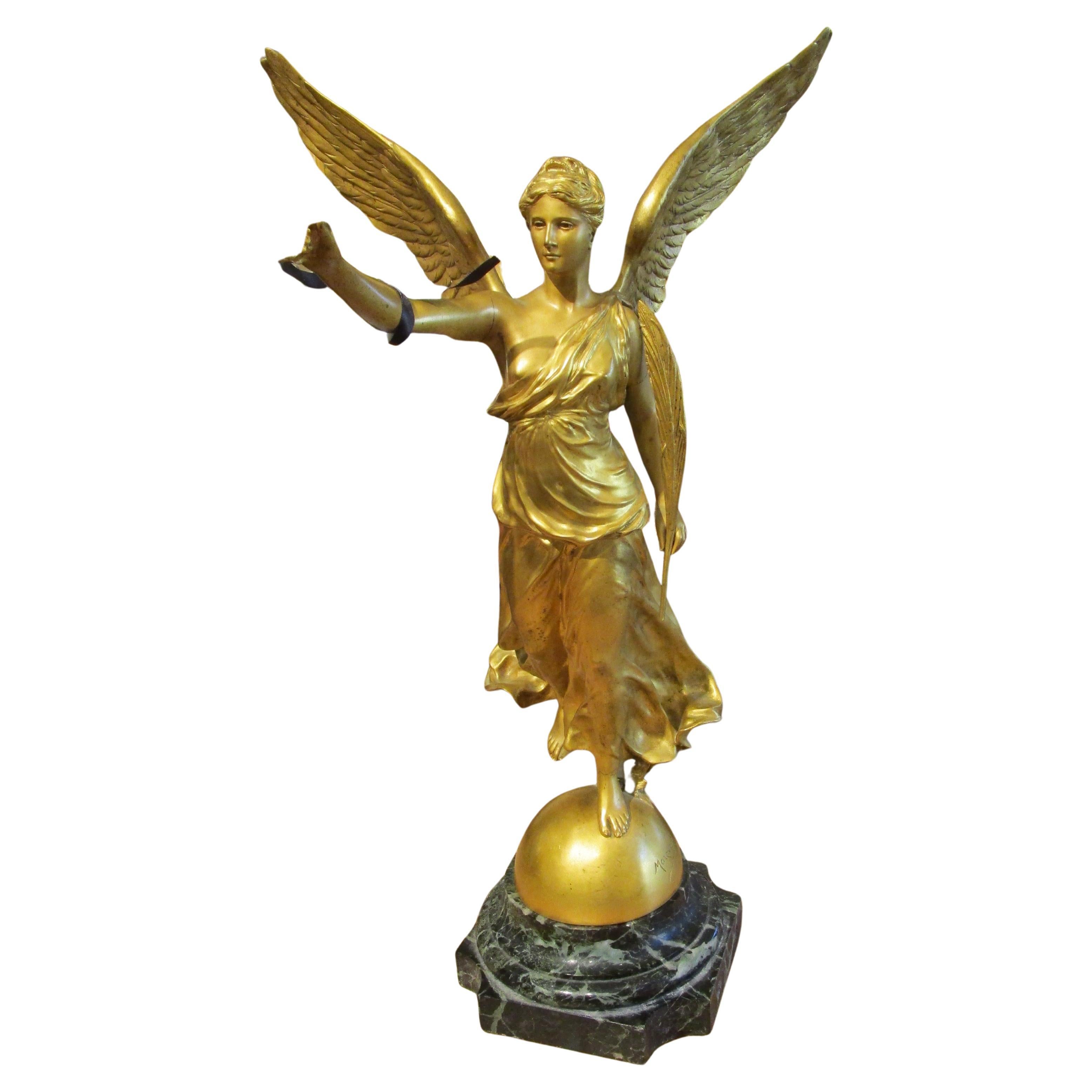 A fine and beautiful large 19th bronze dore statue of winged victory . Signed For Sale