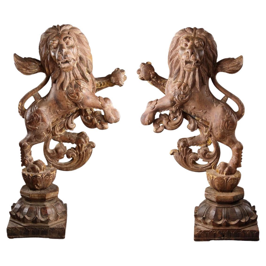A Fine and Decorative Pair of Rampant Lions For Sale