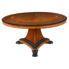 Une belle et importante table centrale Regency Pollard en chêne et ébène