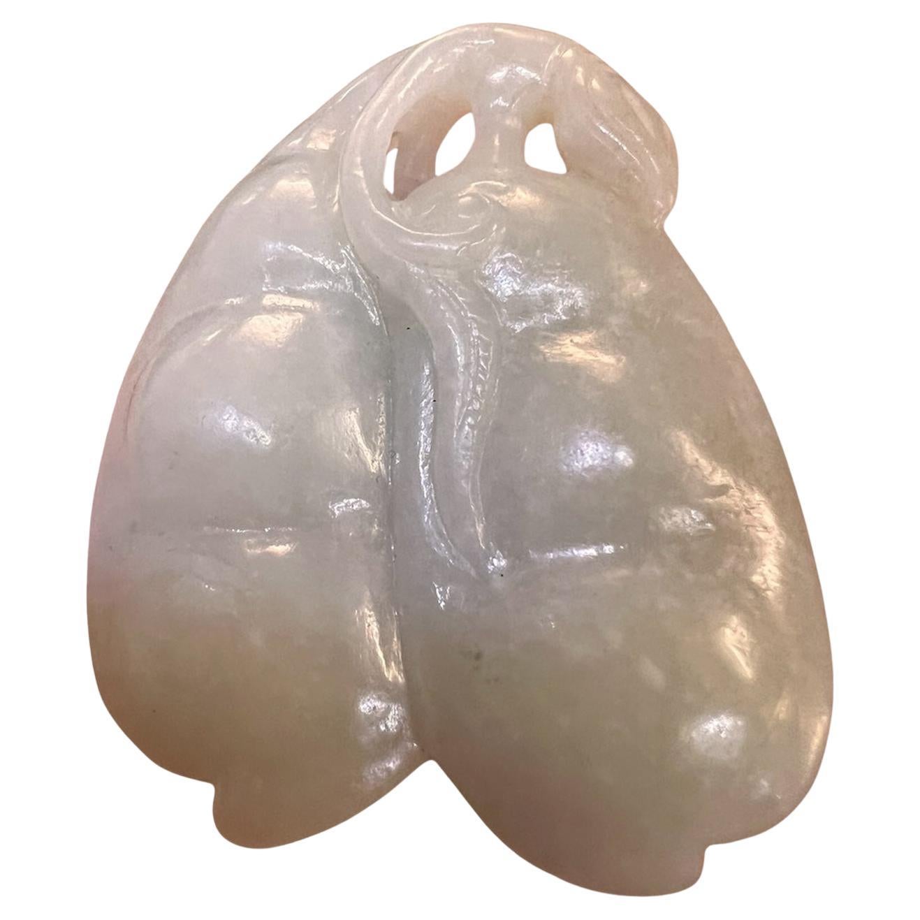 A FINE AND LARGE CHINESE WHITE JADE BEAN TOGGLE/PENDANT. 19/20th C
