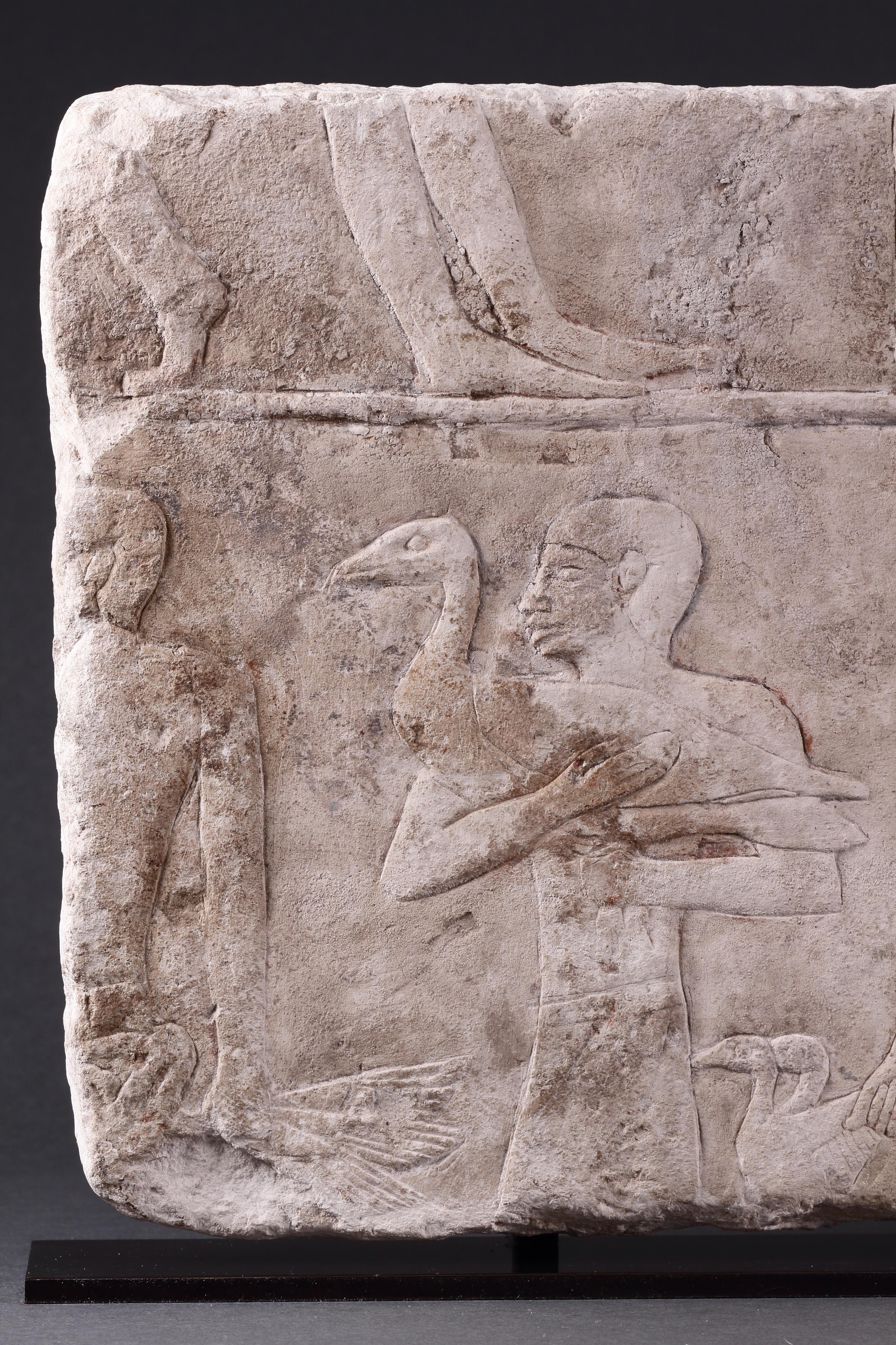A Fine and Large Egyptian Limestone Relief Carved in Shallow Relief 
Traces of original polychrome 
Old Kingdom / 5th Dynasty / 2454 - 2311 B.C 

Size: 32cm high, 70cm wide, 5cm deep - 12½ ins high, 27½ ins wide, 2 ins deep 

Provenance:
Ex Private