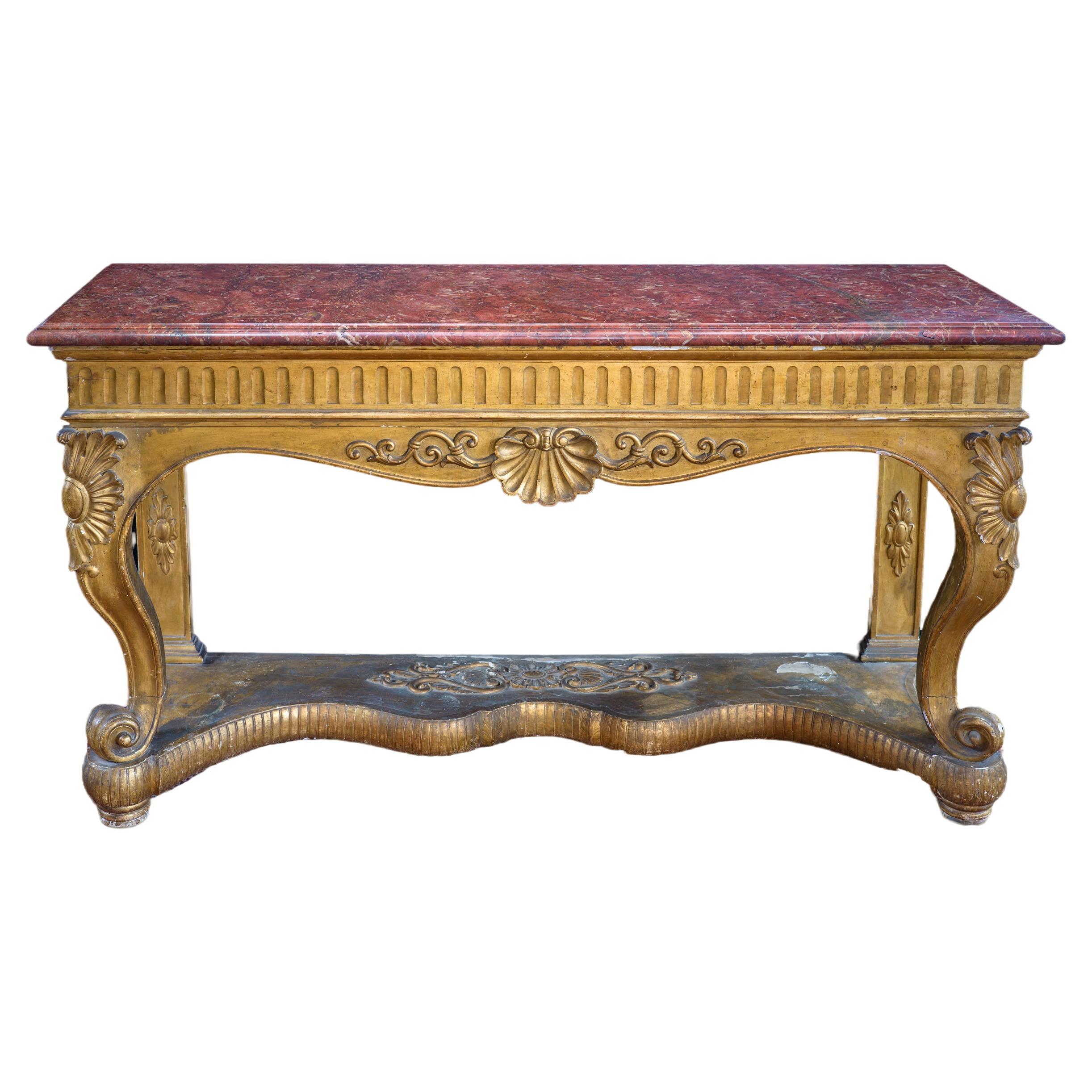 A fine and large giltwood Italian console or game table/ Table à Gibier For Sale