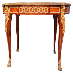 a fine and rare 19th c French gilt and marble top center table . Signed F. Linke