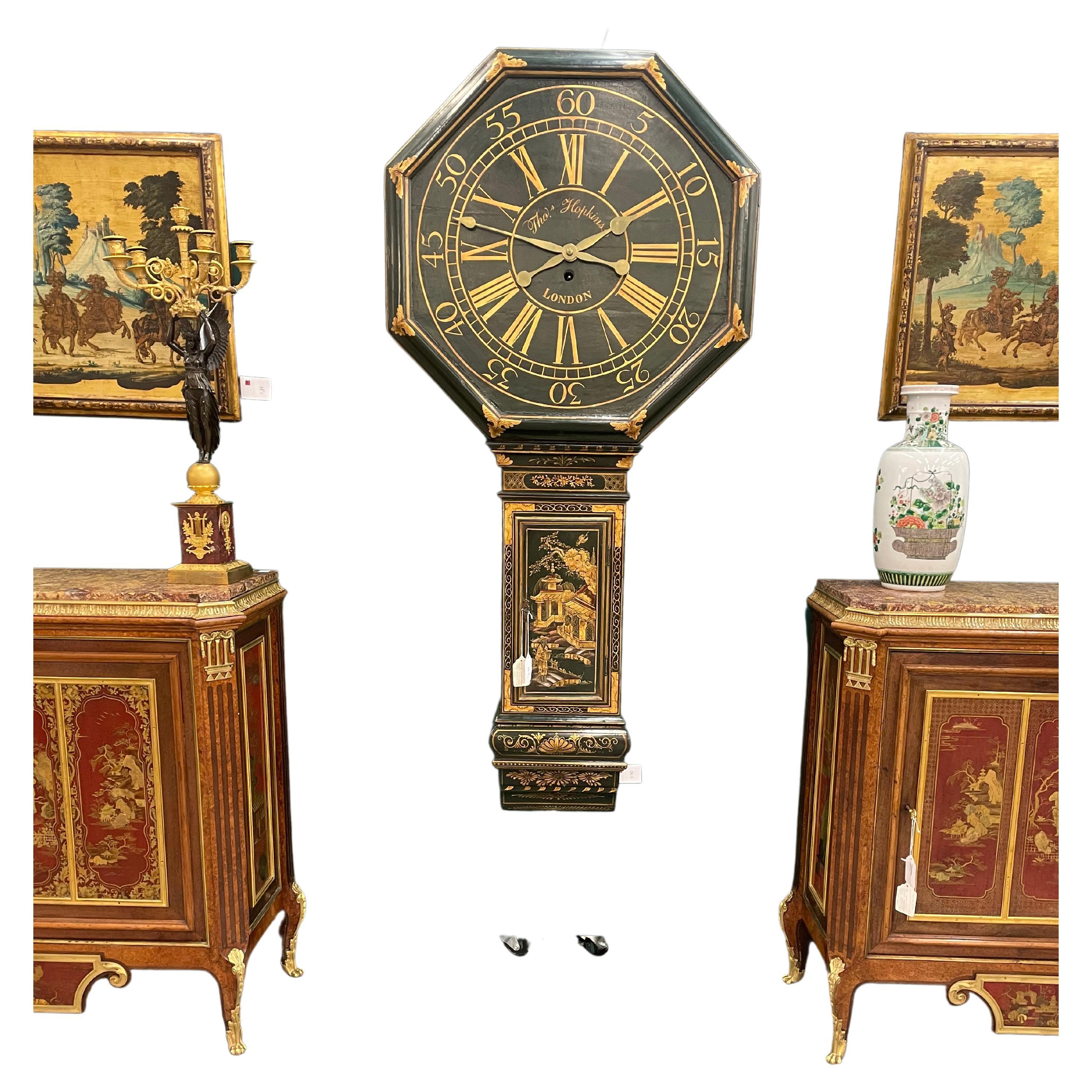 A George III parcel gilt and black Chinoiserie decorated tavern clock
Thomas Hopkins, London
circa 1800
The circular dial with Roman hours and Arabic minutes inscribed Thos Hopkins / London, with single train movement.
height 72in (183cm); width