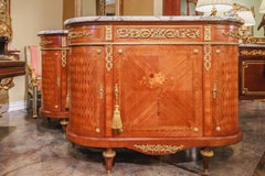 A fine and rare pair of 19th c French Louis XVI satinwood and marquetry cabinets