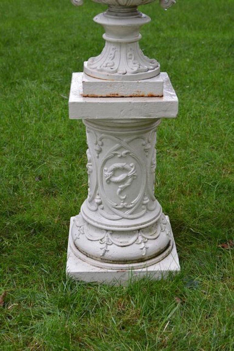 American Pair of White Painted Cast-Iron Urns on Pedestals