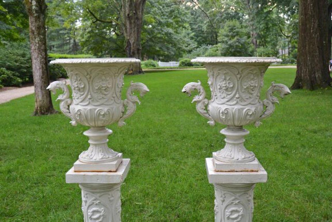 Pair of White Painted Cast-Iron Urns on Pedestals In Good Condition In Katonah, NY