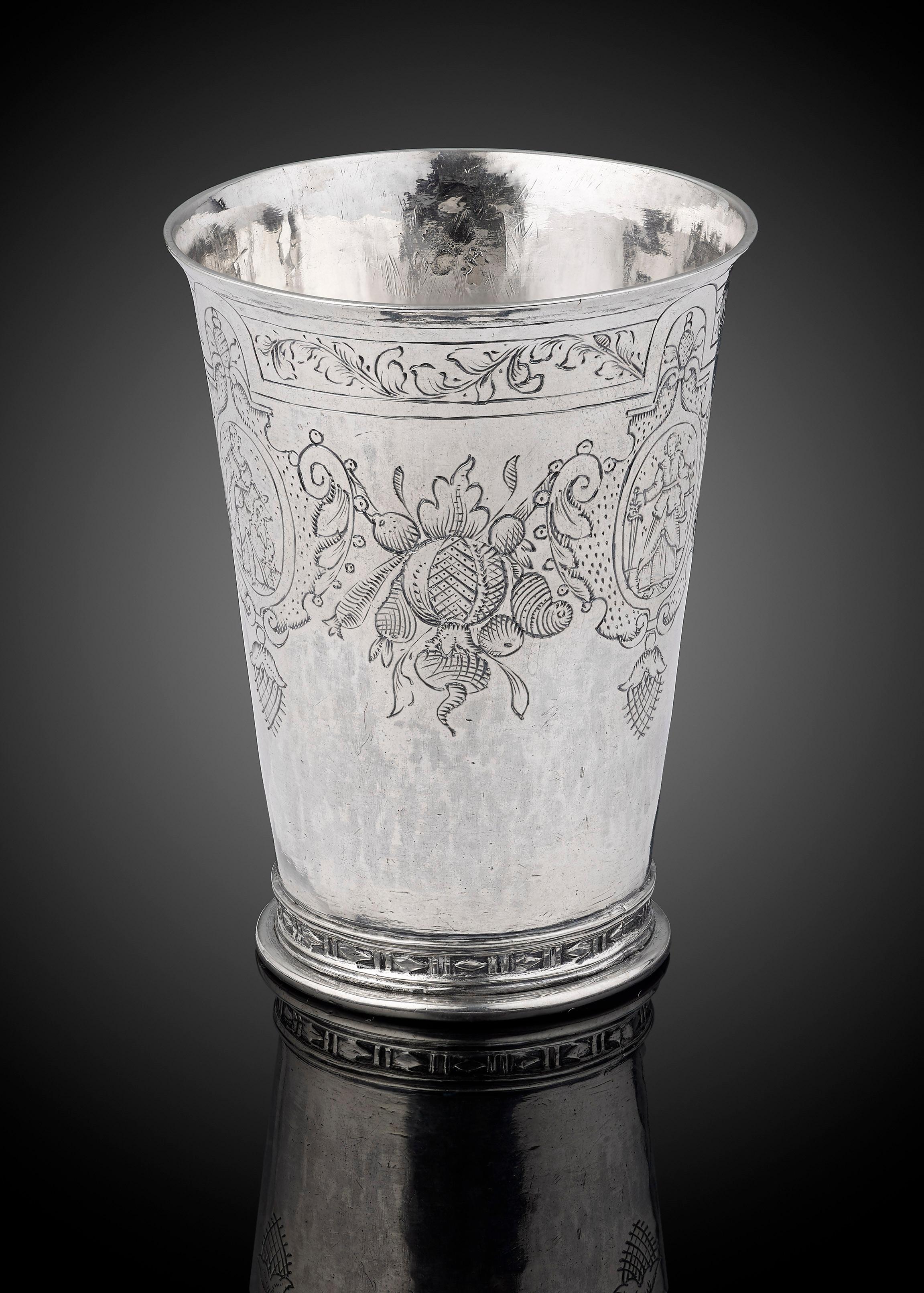 A fine and rare silver beaker, Cologne, circa 1600; the maker Ludwig Kaff Il; almost certainly it seems this piece was made for a lady; it is delicately engraved around the side with three Allegories of Virtue; there is a lady with a lamb for