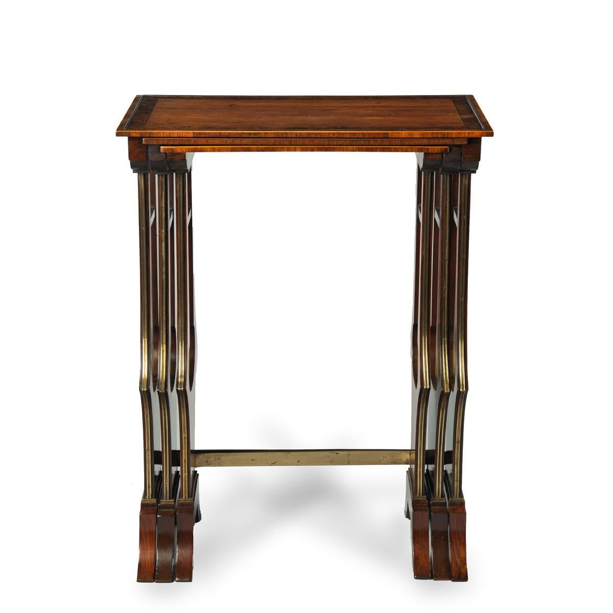 Mahogany A fine and unusual nest of three Regency tables For Sale