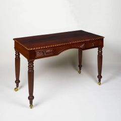 A Fine Anglo-Indian Carved Padouk Writing Table, Ceylonese