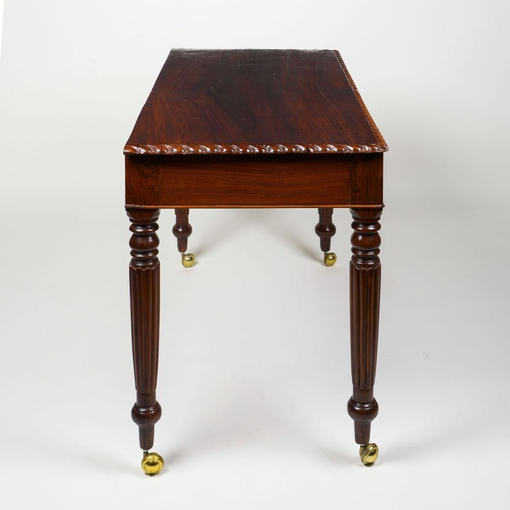 Sri Lankan A Fine Anglo-Indian Carved Padouk Writing Table, Ceylonese