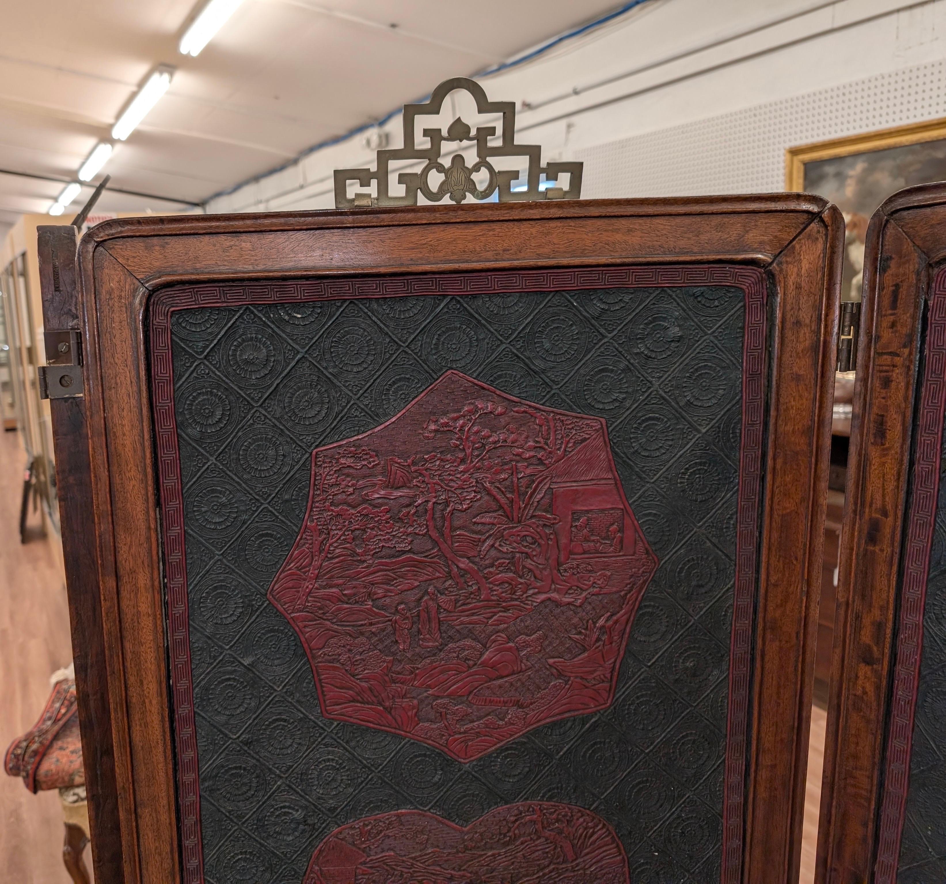 Cinese A Fine Antique Chinese Lacquer and Hardwood Folding Screen in vendita