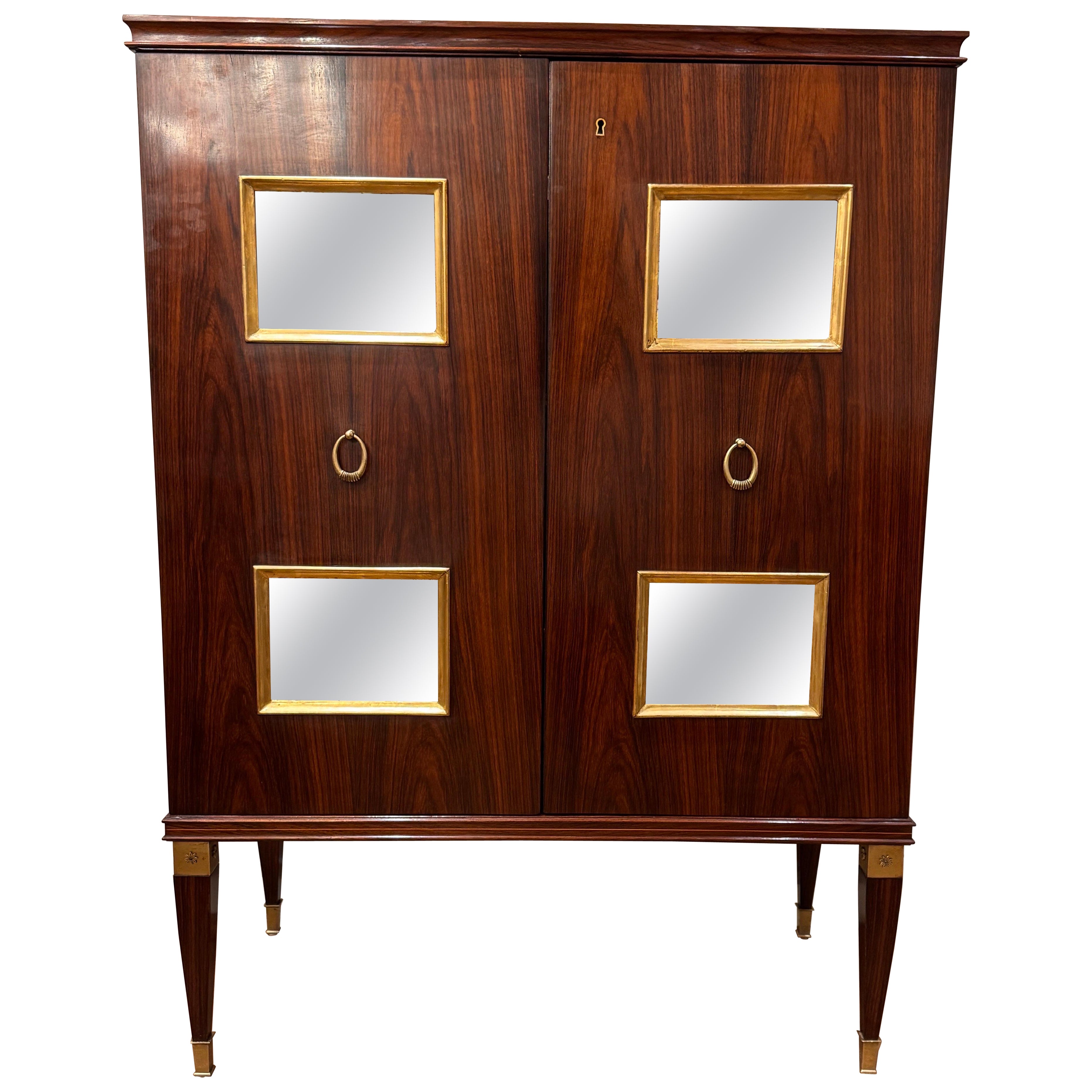 A fine bar cabinet by Paolo Buffa with mirrored panels