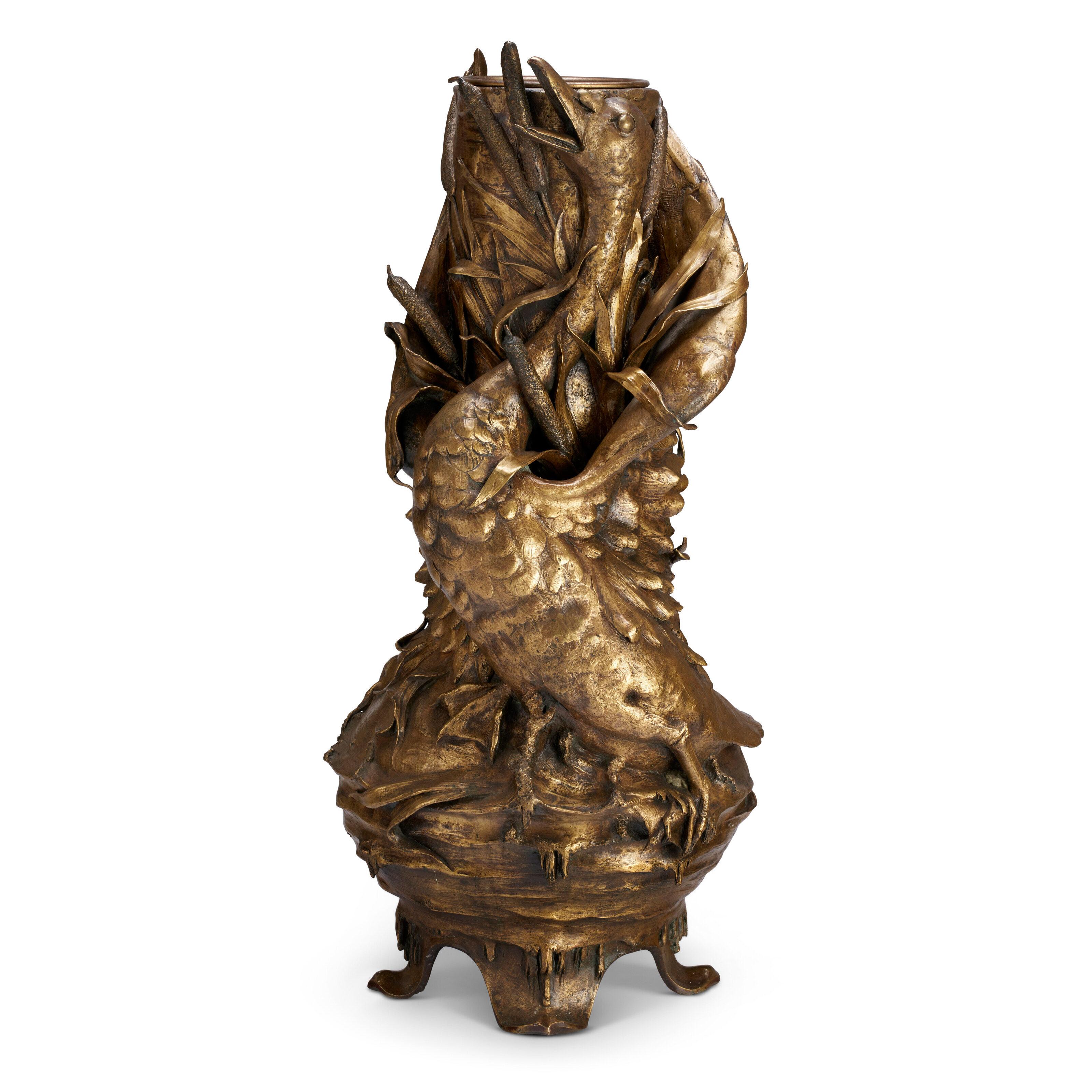 A unique gilt bronze swan vase by Jean-Baptiste Sloodts.

Artist: Jean-Baptiste Sloodts (b.1843, Belgian)
Date: late 19th century
Medium: Gilt bronze
Signature: Signed to body JB'te Sloodts; Inscribed Cie des Bronzes / Bruxelles / fonte a cire