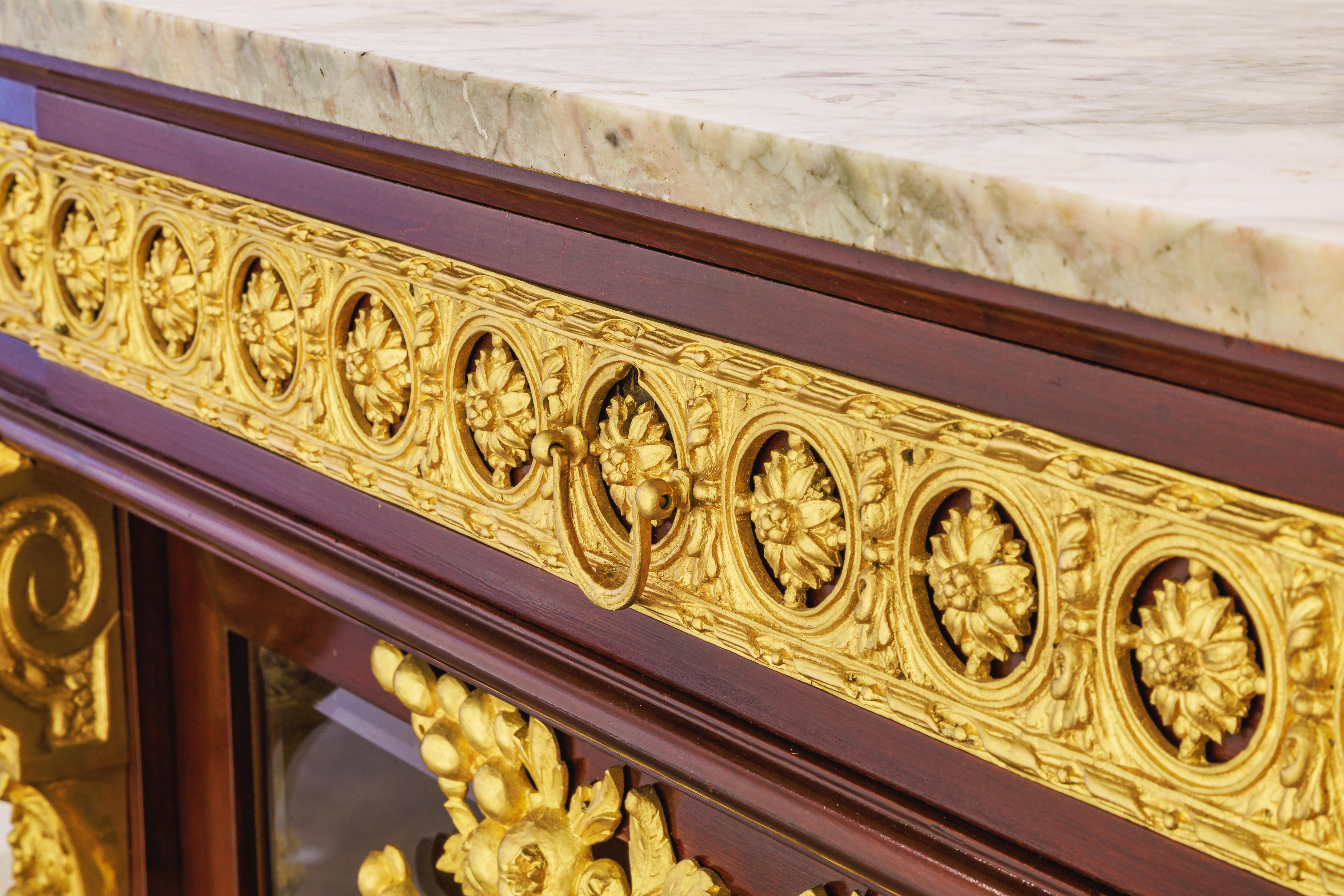 Gilt A fine Belle Epoque  mahogany and gilt bronze mounted display cabinet . For Sale