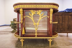 A fine Belle Epoque  mahogany and gilt bronze mounted display cabinet .