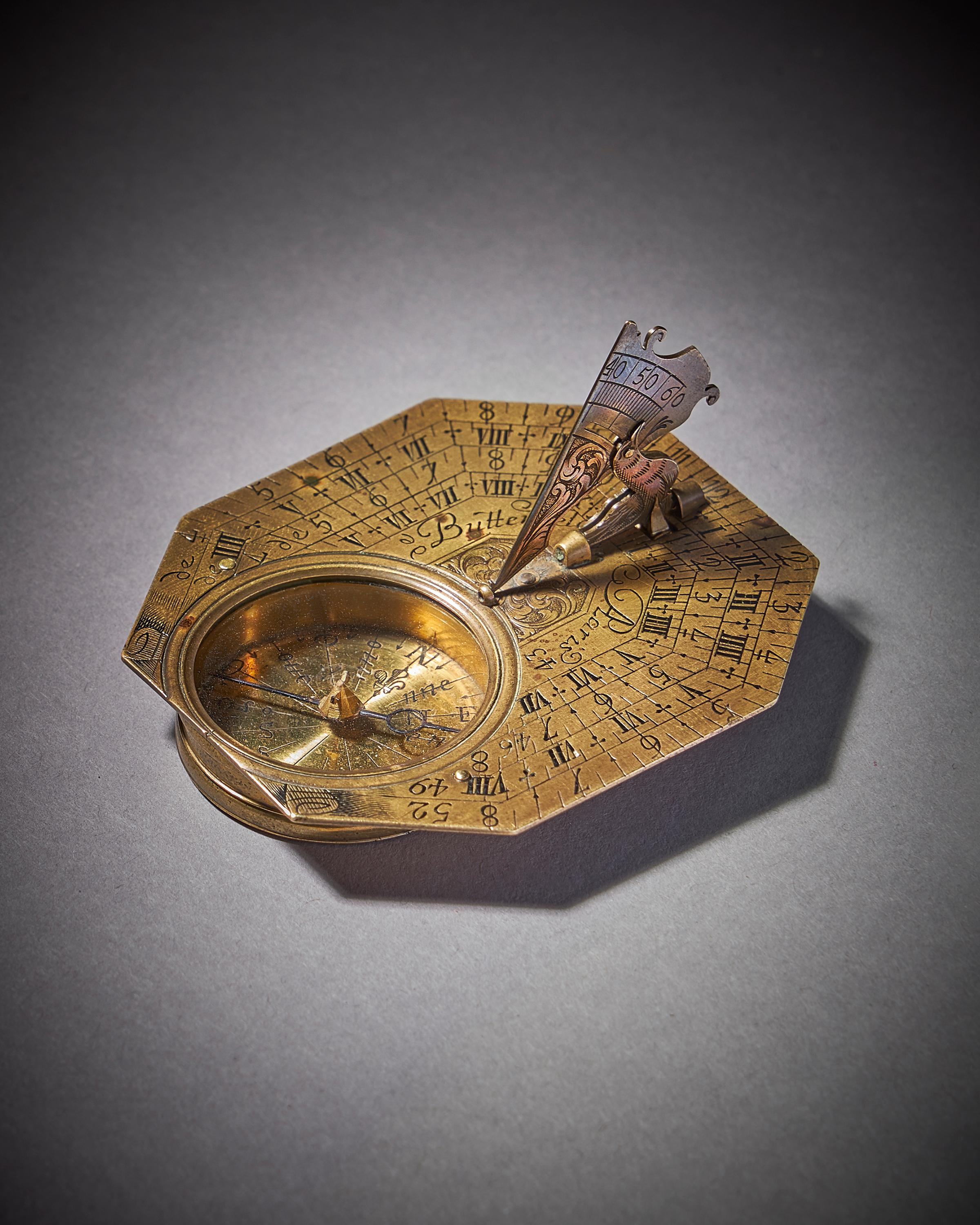 A fine brass Anglo-French octagonal pocket sundial with compass by Michael Butterfield, circa 1700. 

The sundial can be used anywhere between latitudes of 40° and 60° covering Southern Spain and Italy north to Scandinavia. The elaborately