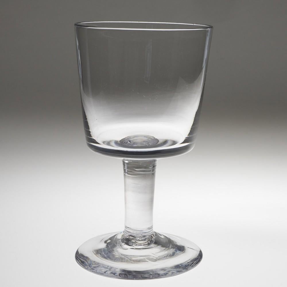Heading : A Fine  Bucket Bowl Goblet
Period : George IV- William IV
Origin : England
Colour : Clear, excellent grey tone
Bowl : Bucket shaped. Good pucella marks
Stem : Tapered plain stem. Good tooling marks around the junction between stem and