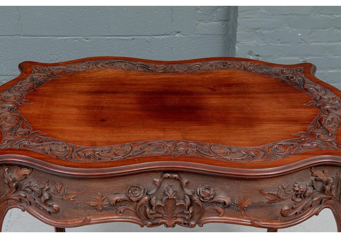 A Fine Carved Turtle Top Parlor Table 1