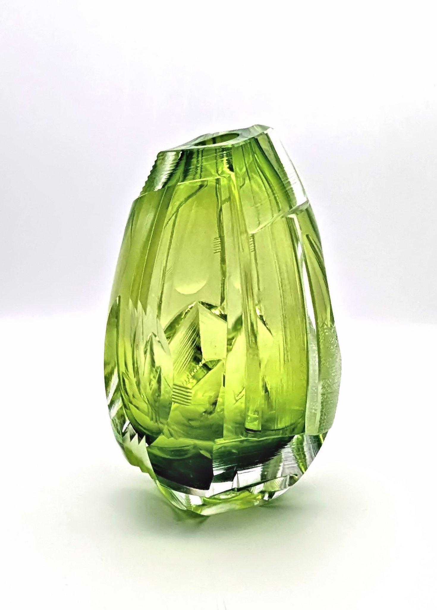 A fine cased and heavily cold worked glass object by Samuel Weisenborn from 2018. The blank made from green glass, thickly cased in clear by Peter Kuchinke in Sweden. Cut and refined in the coldwork studio by Samuel Weisenborn in Schiesheim in