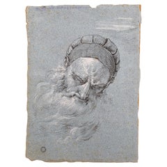 Eine feine Hell-Dunkel-Zeichnung eines nachdenklichen venezianischen Mannes mit Bärmeln auf blauem Papier