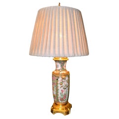 Fine Chinese Cantonese Rouleau Shaped Famille Rose Lamp with a Gilt Bronze