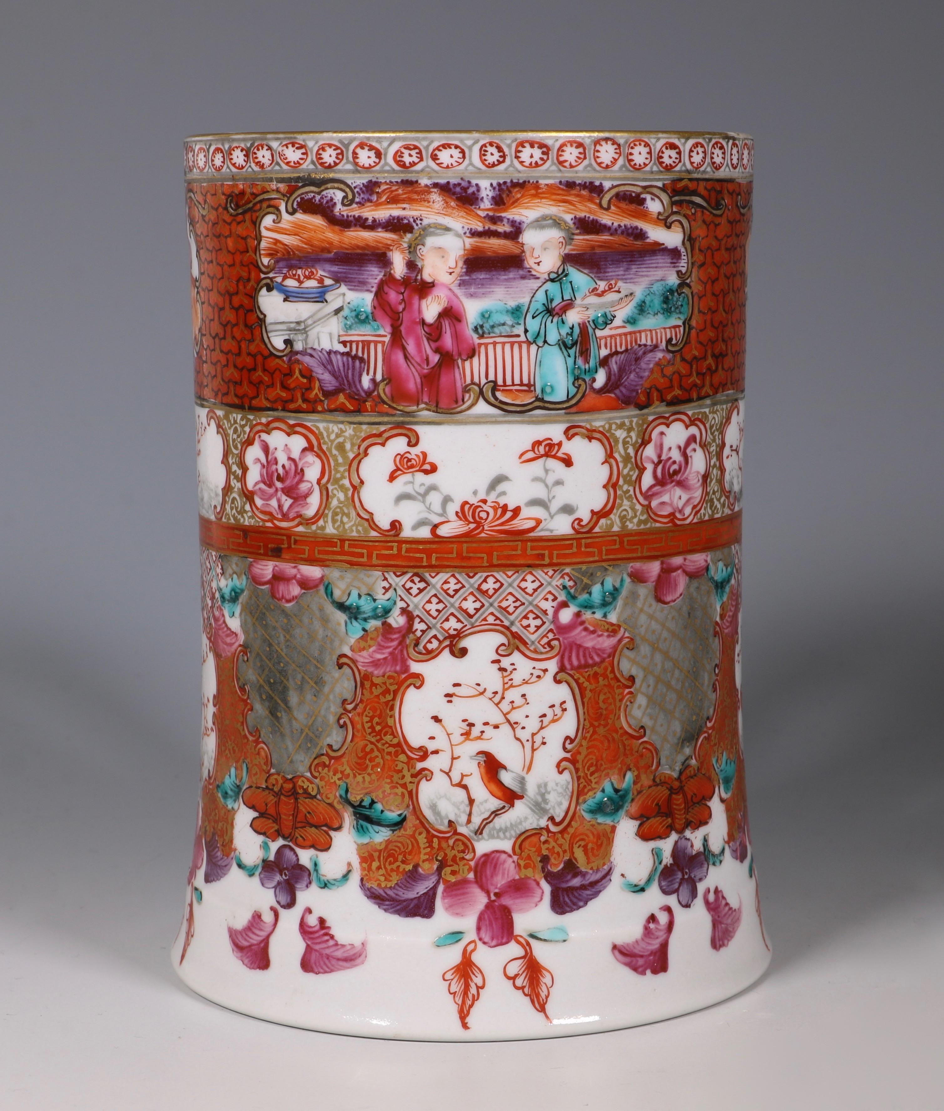 A fine Famille rose tankard. The tall cylindrical body with flared base and handle with heart shaped terminal. Finely decorated with panels of figures and birds on various diaper grounds.
Qianlong C1770