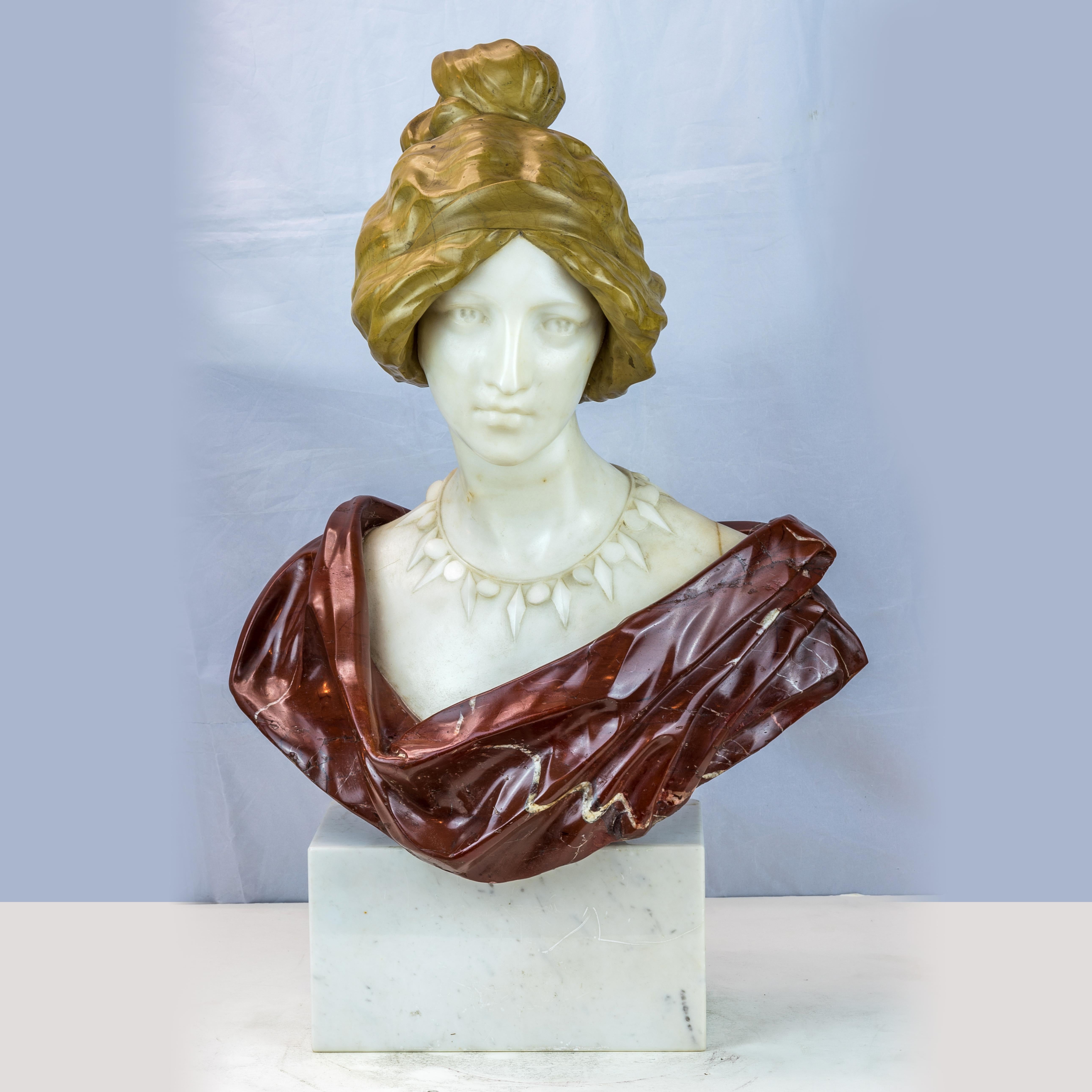 A fine colorful French variegated marble bust of a young lady

Origin: French
Date: circa 1880
Dimension: H: 25 in. x W: 17 in. x D: 10 in.