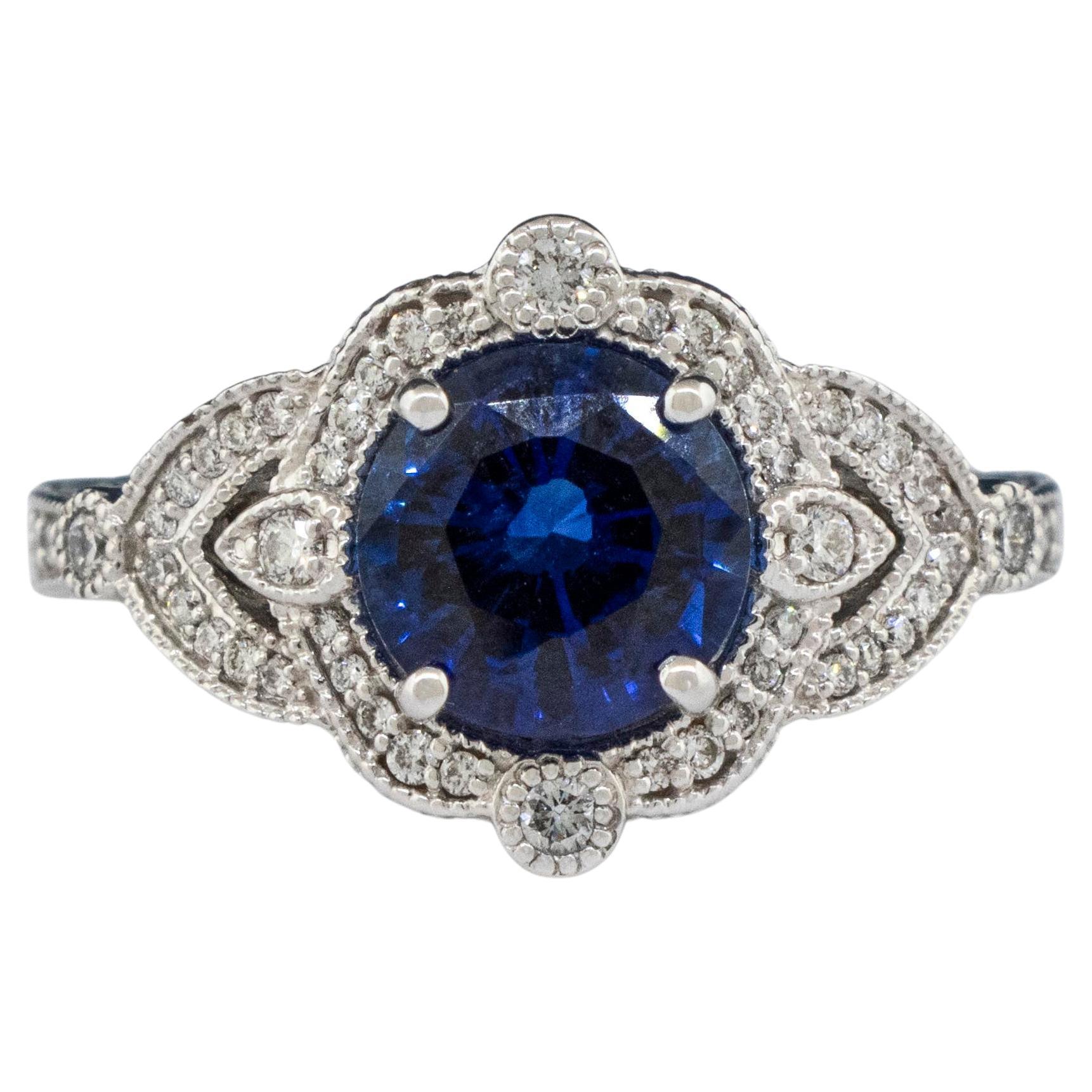 A Fine Deep Blue Sapphire in a 14K White Gold Diamond Ring