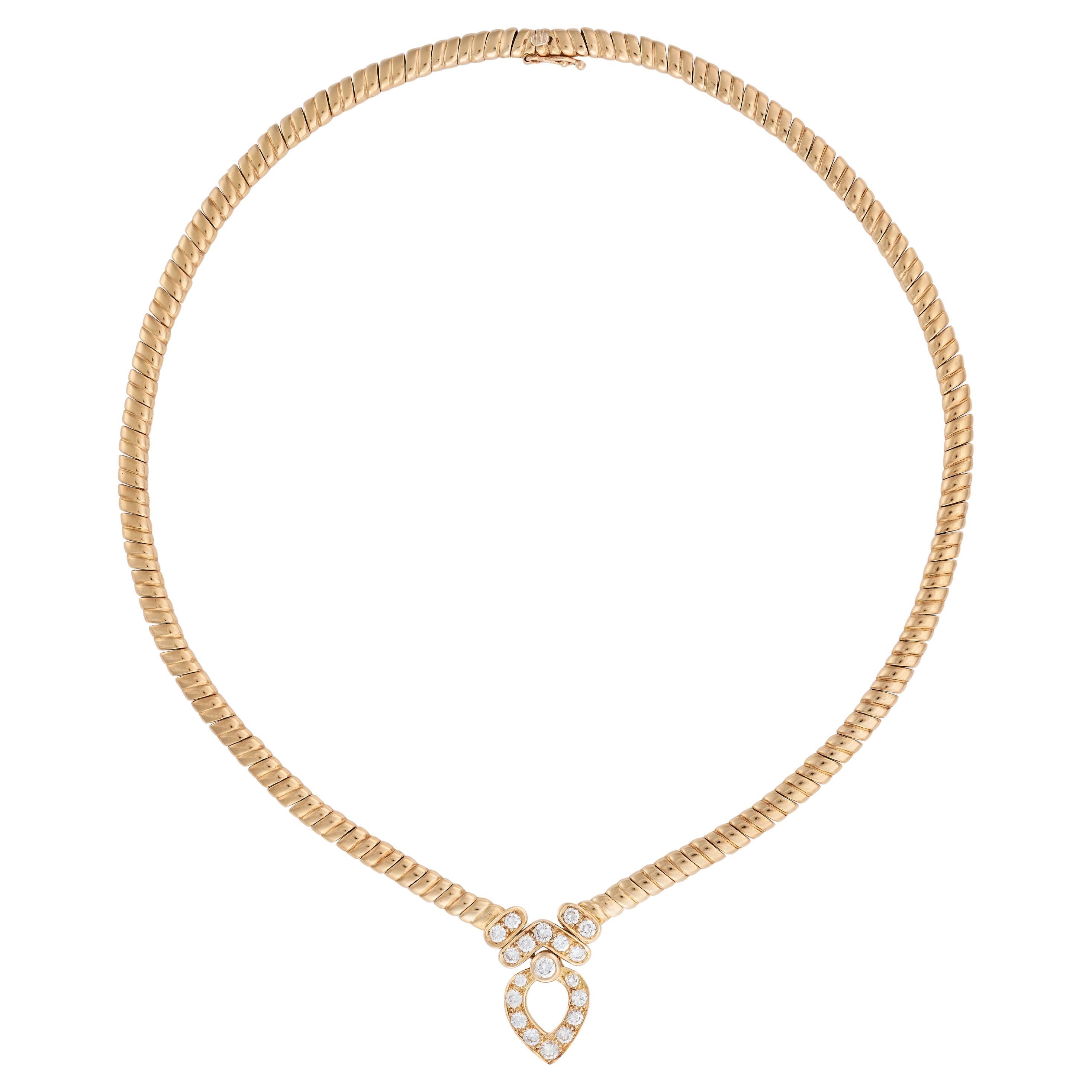 A fine diamond pendant necklace by Van Cleef and Arpels