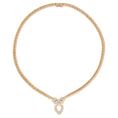 Un fino collar colgante de diamantes de Van Cleef & Arpels